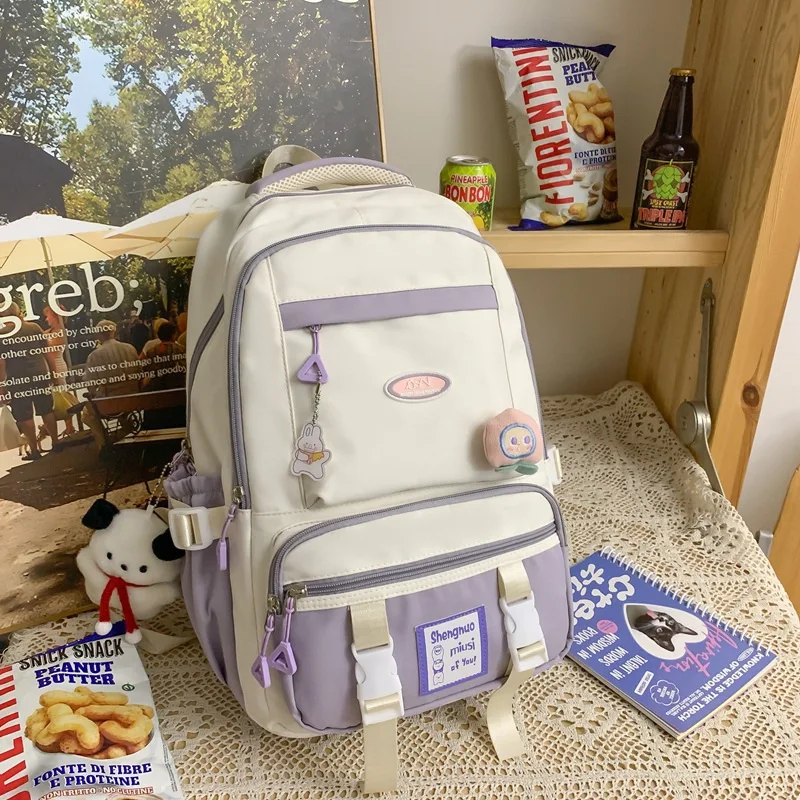 Mochila escolar para estudiantes de escuela primaria, Color de contraste, alivio de carga versátil, nueva