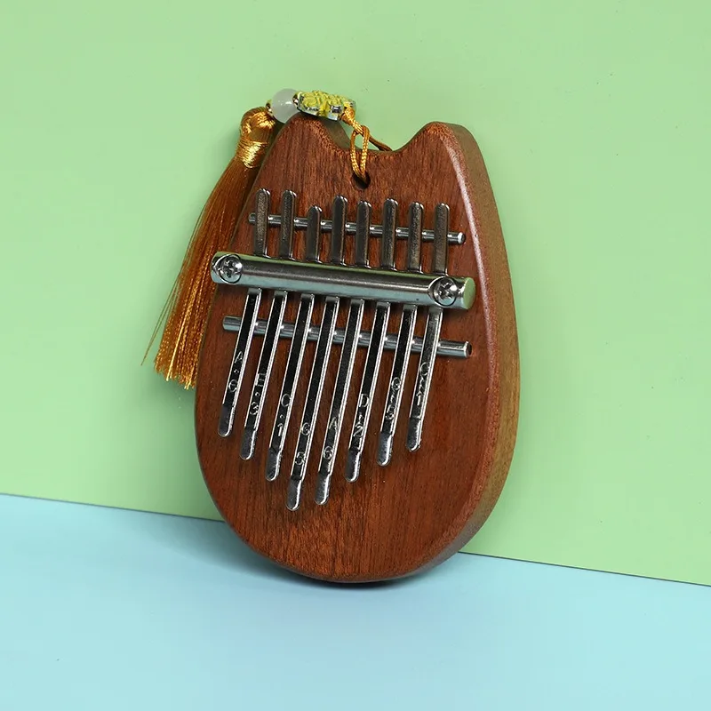 

Калимба из цельного дерева, средняя октава, миниатюрное пианино для большого пальца, портативное милое калимба для начинающих, ударные музыкальные инструменты на палец