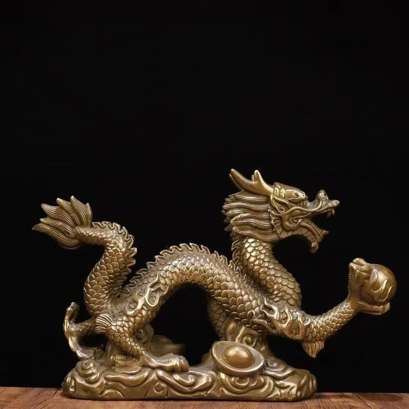 The decorative item is a handicraft made of brass. It features a green dragon, symbolizing attracting customers.