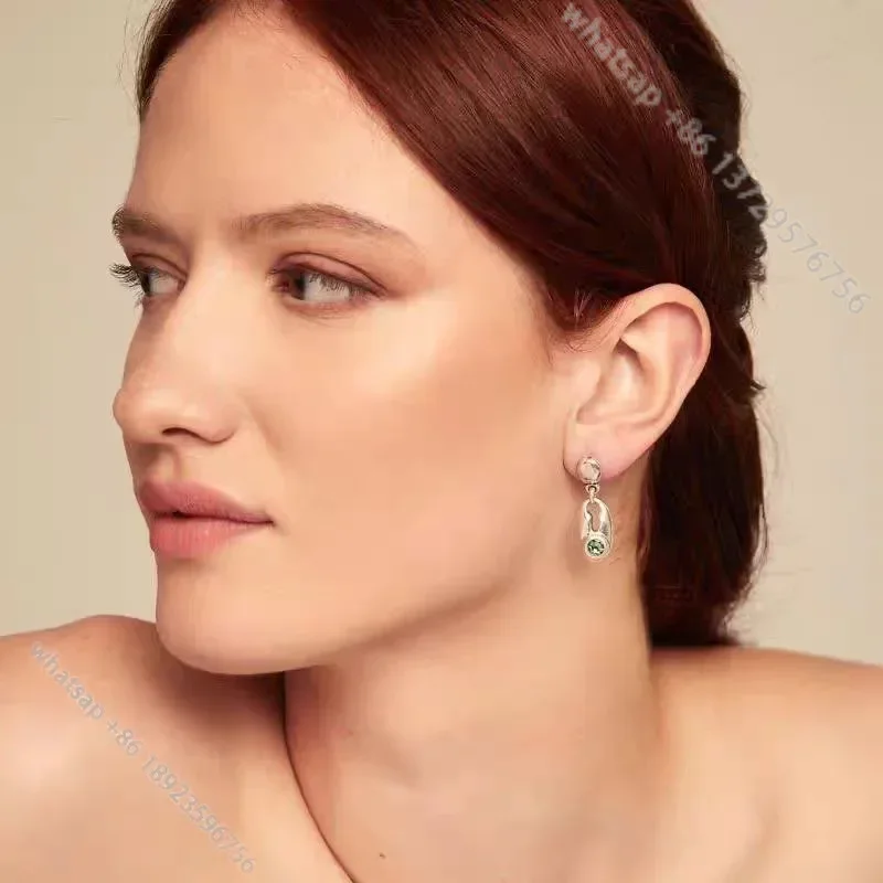 

Сережки с зелеными кристаллами, Европейский и американский стиль