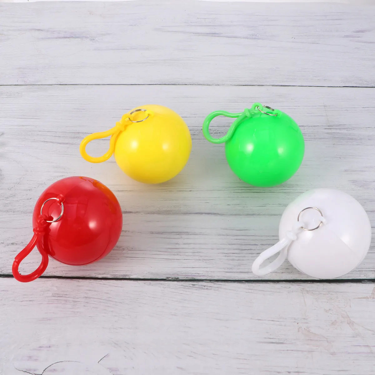 4Pcs Raincoat Ball Portable Lightweight Keyring Ball Poncho Unisex Foldable Mini Raincoat Bag Hook Outdoor Travel Camping