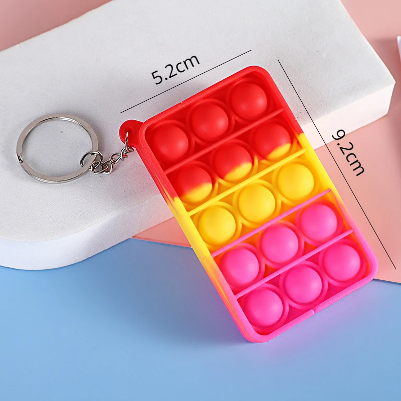 ミニプッシュポップ減圧おもちゃシリコーンレインボーキーホルダーストレスリリーフおもちゃ抗ストレスコントローラ知育玩具