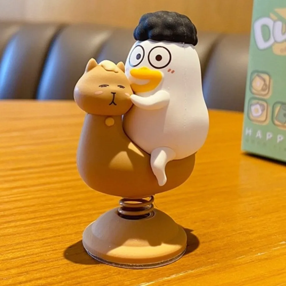 Divertido pequeño pato Liu agitando adornos de coche colección estatua pequeño pato Liu decoración de coche lindo coche de dibujos animados figura de Bobblehead