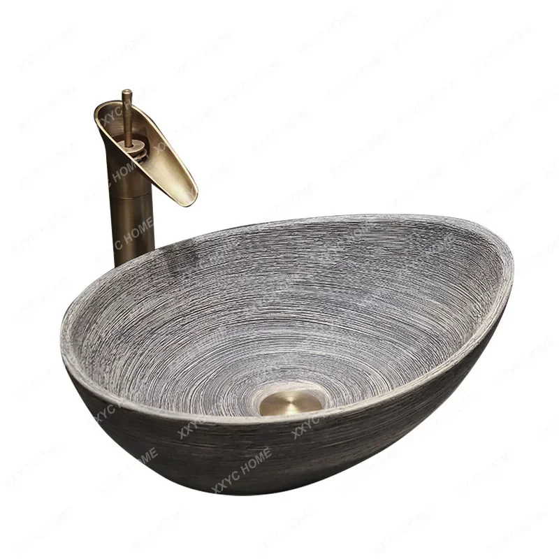 Counter basin Anti-splashing washbasin Single basin Ceramic art retro washbasin Household bathroom Washbasin