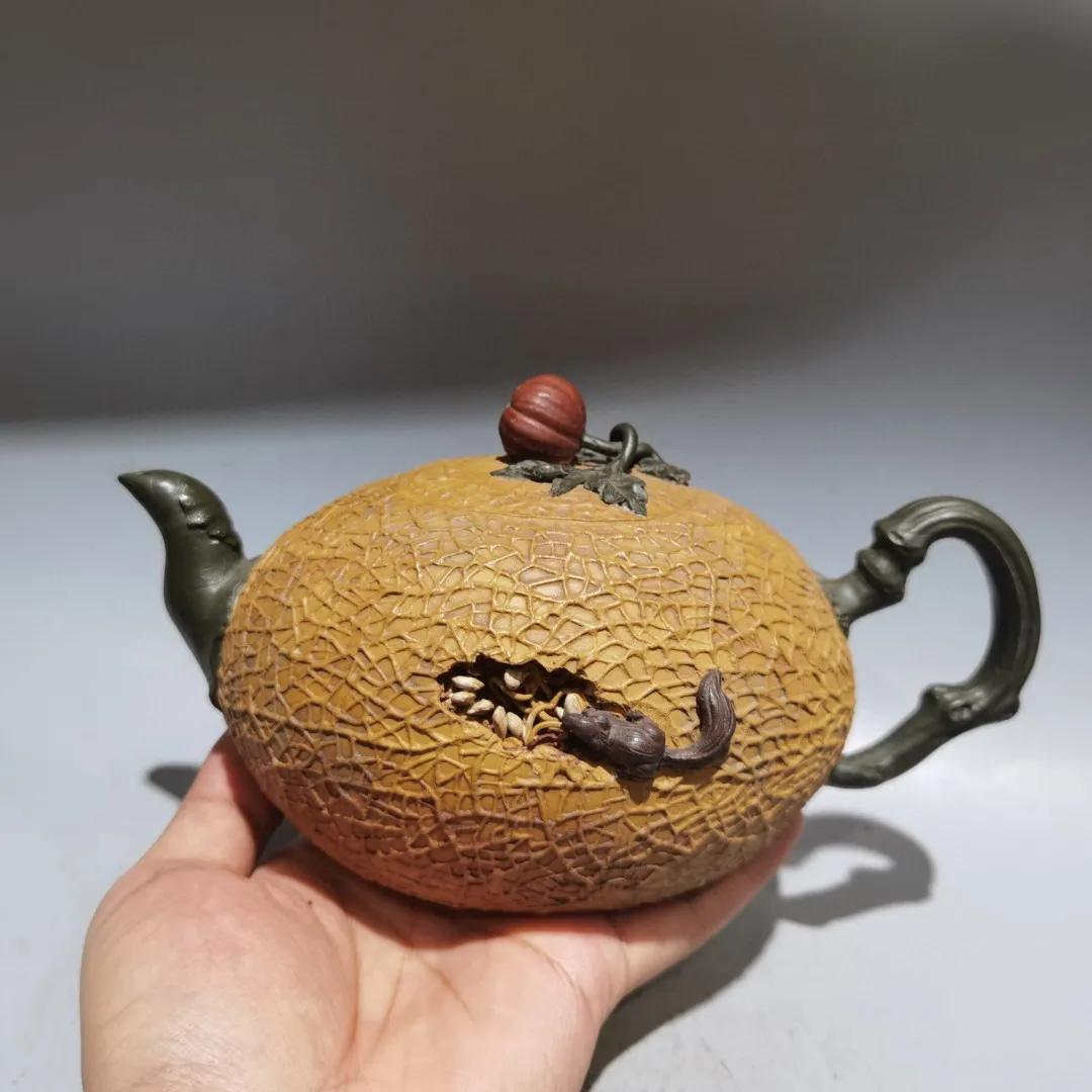 Olla de arcilla púrpura Guagai Hami, olla en forma de melón, patrón de nido de ardilla, tetera hueca, tetera, tetera