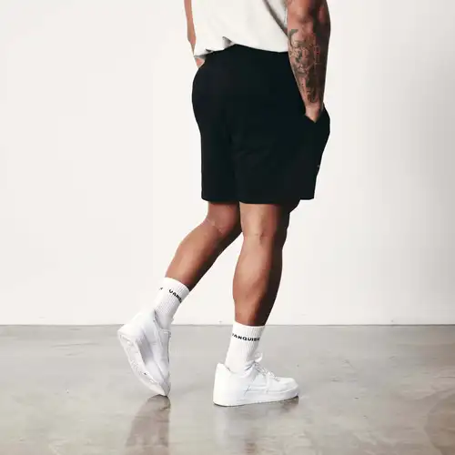 Imagen 2 del producto 2025 Nuevo músculo Fitness deportes de verano Casual algodón pantalones de cinco puntos corriendo pantalones cortos sueltos para hombres