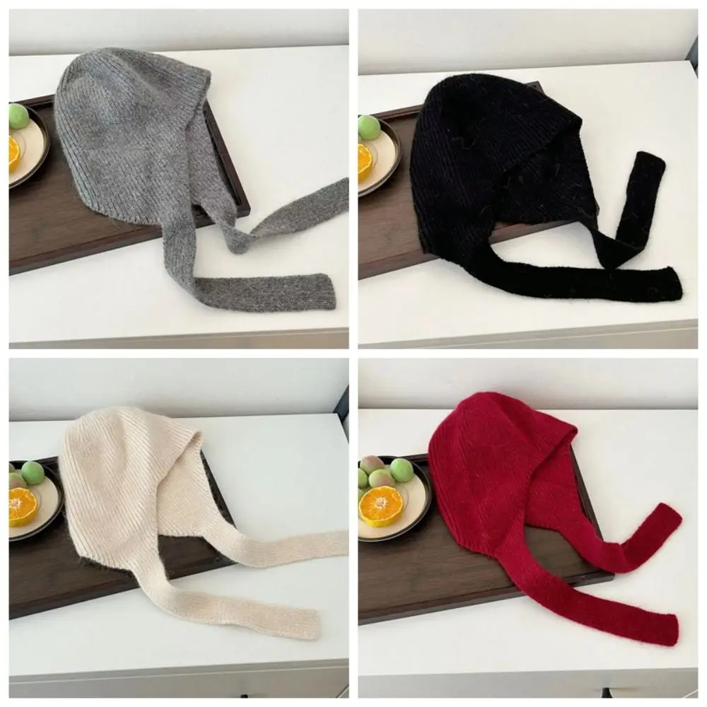 Minimalistische Strickmütze mit Ohrenklappen, winddicht, einfarbig, mit Bindeband, verdicktes Band, koreanischer Stil, trendige Damenmütze. – Detail 2