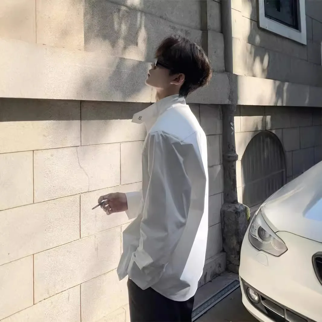 Long-sleeved Shirt Minimalist Design Metal Buckle Stand-collar Shirt Slant Pocket Shoulder Pads Men Solid Simple Loose Casual