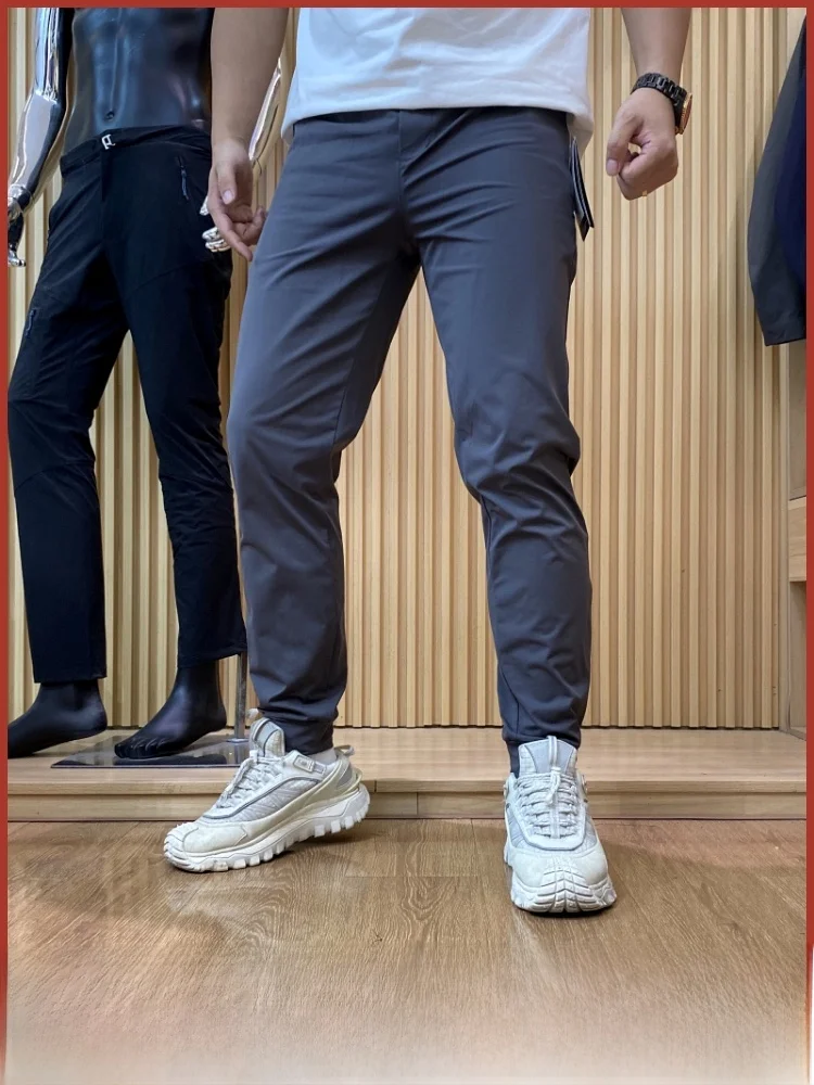

Men's Comfortable Breathable Sweat Absorbent Elastic Outdoor Sports Running Pants Casual Long Trousers Trendy Basic Color