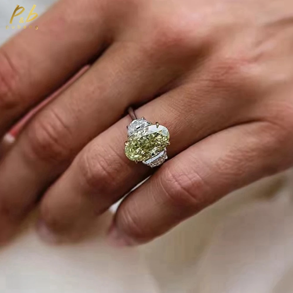

PuBang Sparkling 3EX VVS1 Moissanite Ring 6 CT Light Yellow Crushed Ice Hybrid Oval Cut Two-Tone 18k White And Yellow Solitaire