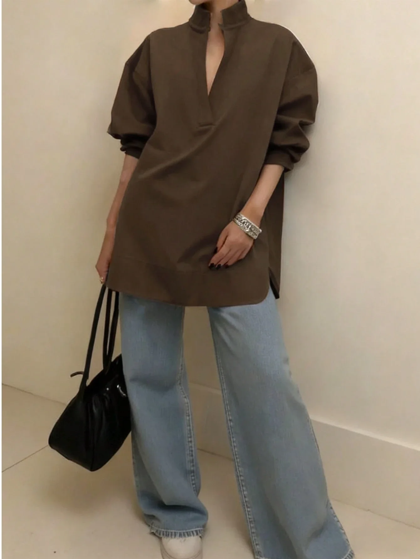 

Women's Casual Loose Long Sleeve Shirt With Notched Collar And Asymmetrical Hem