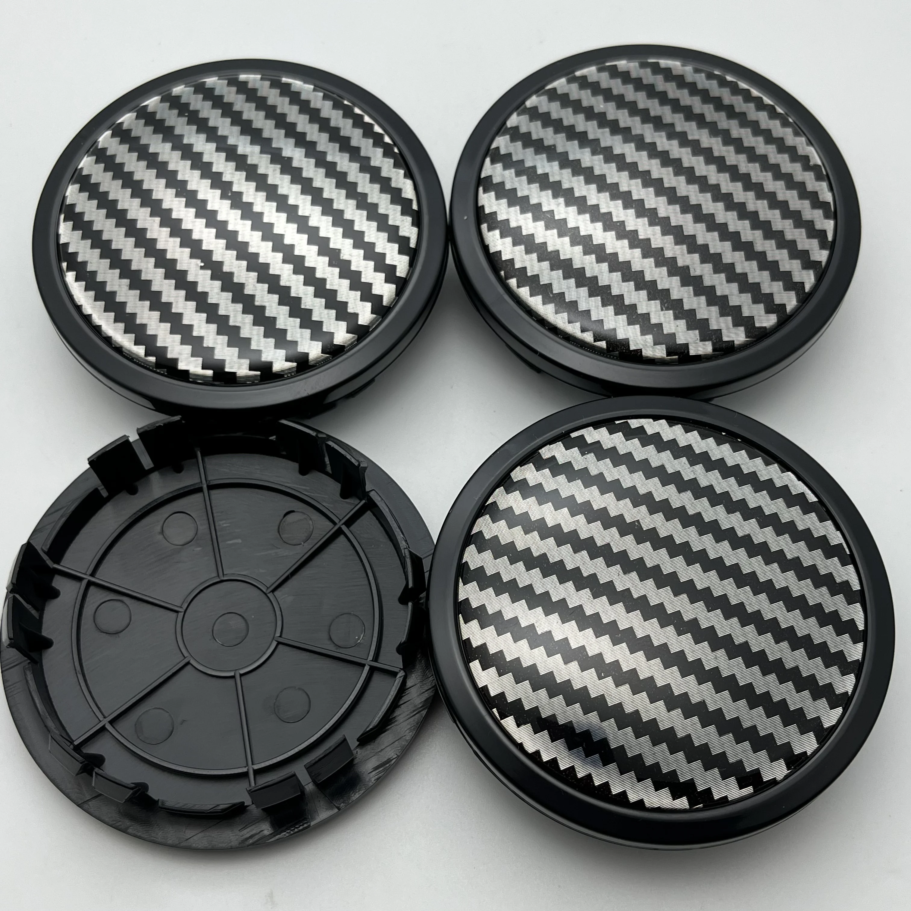 

4pcs /Lot 75mm New Style Wheel Center Caps With 65mm Carbon Fibre Emblem Logo Sticker Rim Cover Styling Accessories for Mercedes