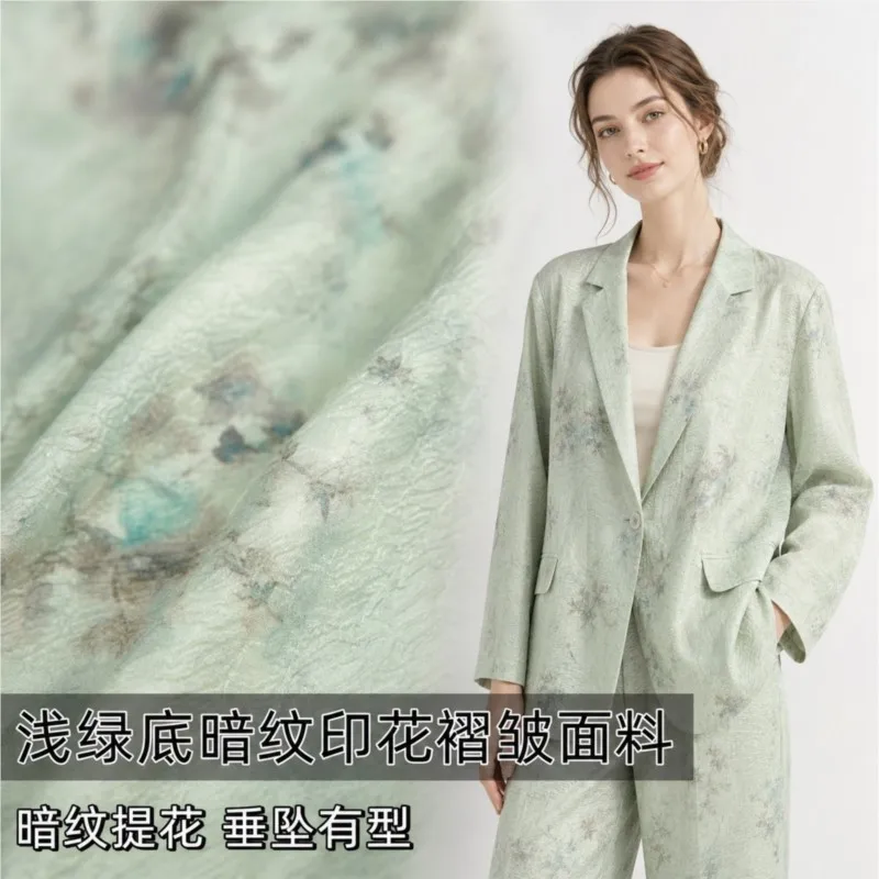 This pendant stylish light green base with subtle jacquard printing and pleated fabric coat is made of Hanfu cheongsam