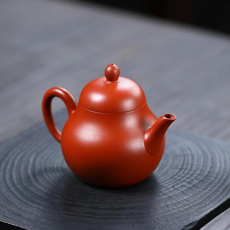 

Yixing Purple Clay Pot Raw Mine Red Clay High Pear shaped Pot Kung Fu Tea Set Handmade Small Tea Pot