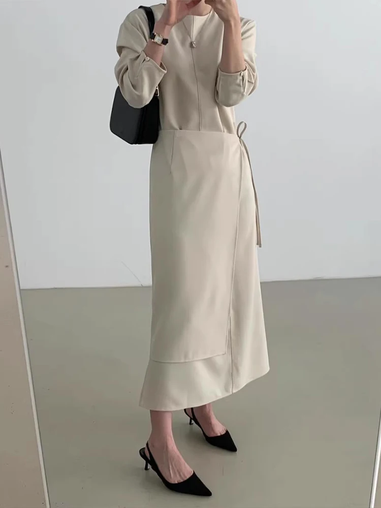 ชุดเดรสผู้หญิงทรงตรงแบบหลวมสไตล์ฤดูใบไม้ร่วง พร้อมกระโปรงซ้อนชั้น สวมใส่สบาย