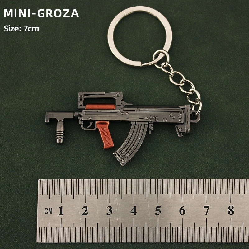 Colgante de periféricos de juego P90 S686 DP-28 Mini llavero de la serie de armas de juguete, modelos de armas de Metal, baratija, regalos pequeños exquisitos para niños