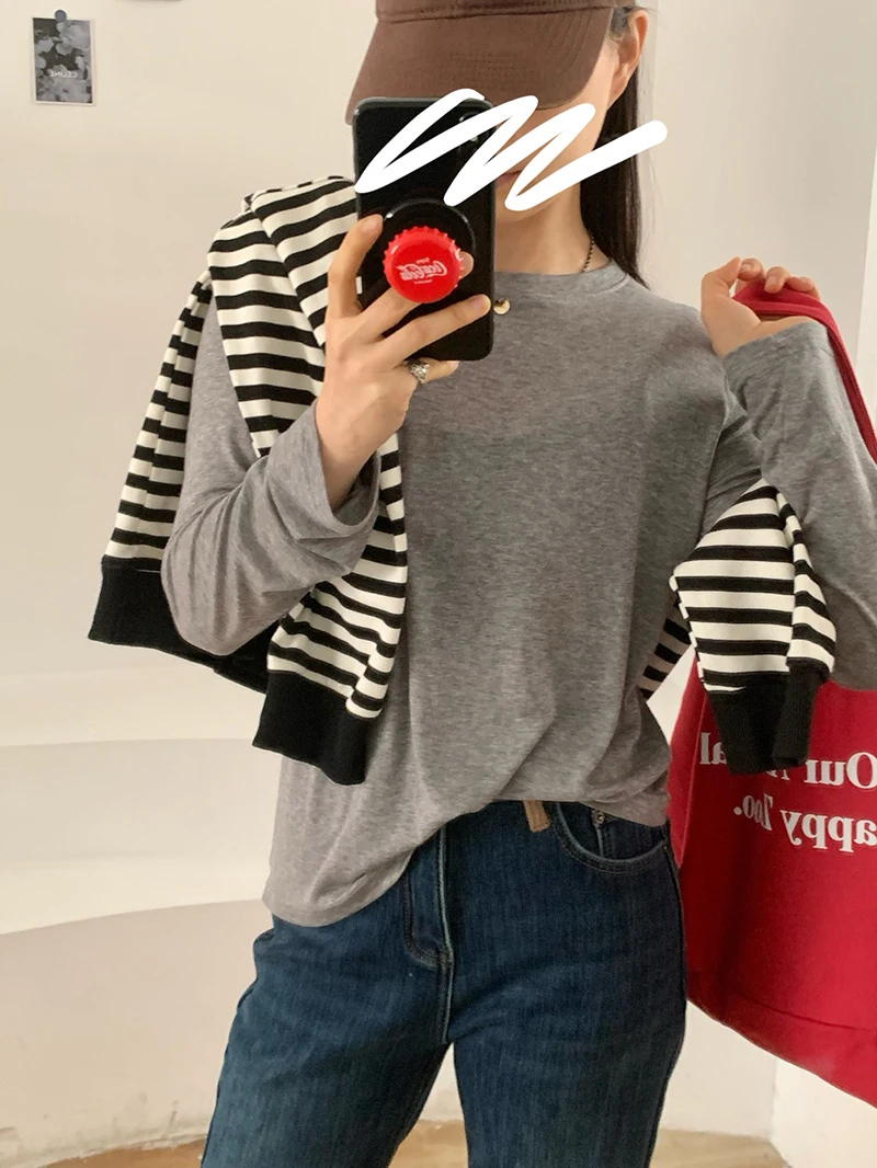 T-shirt ampia a maniche lunghe girocollo tinta unita casual da donna autunno e inverno