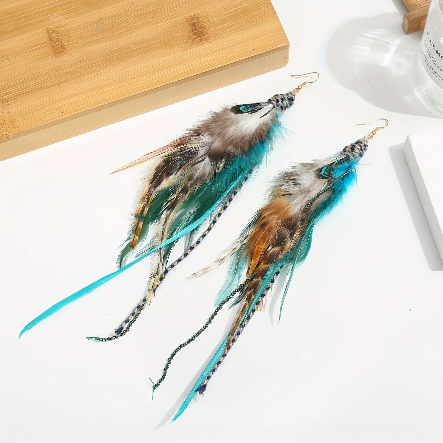 1-piece fashionable Bohemian ethnic style feather earrings with exquisite tassel beads suitable for girls and women's earrings