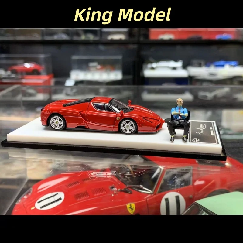 

В наличии: металлическая красная модель автомобиля Ferrari Enzo 1:64 с открывающимися передними и задними крышками, игрушка для мальчиков.