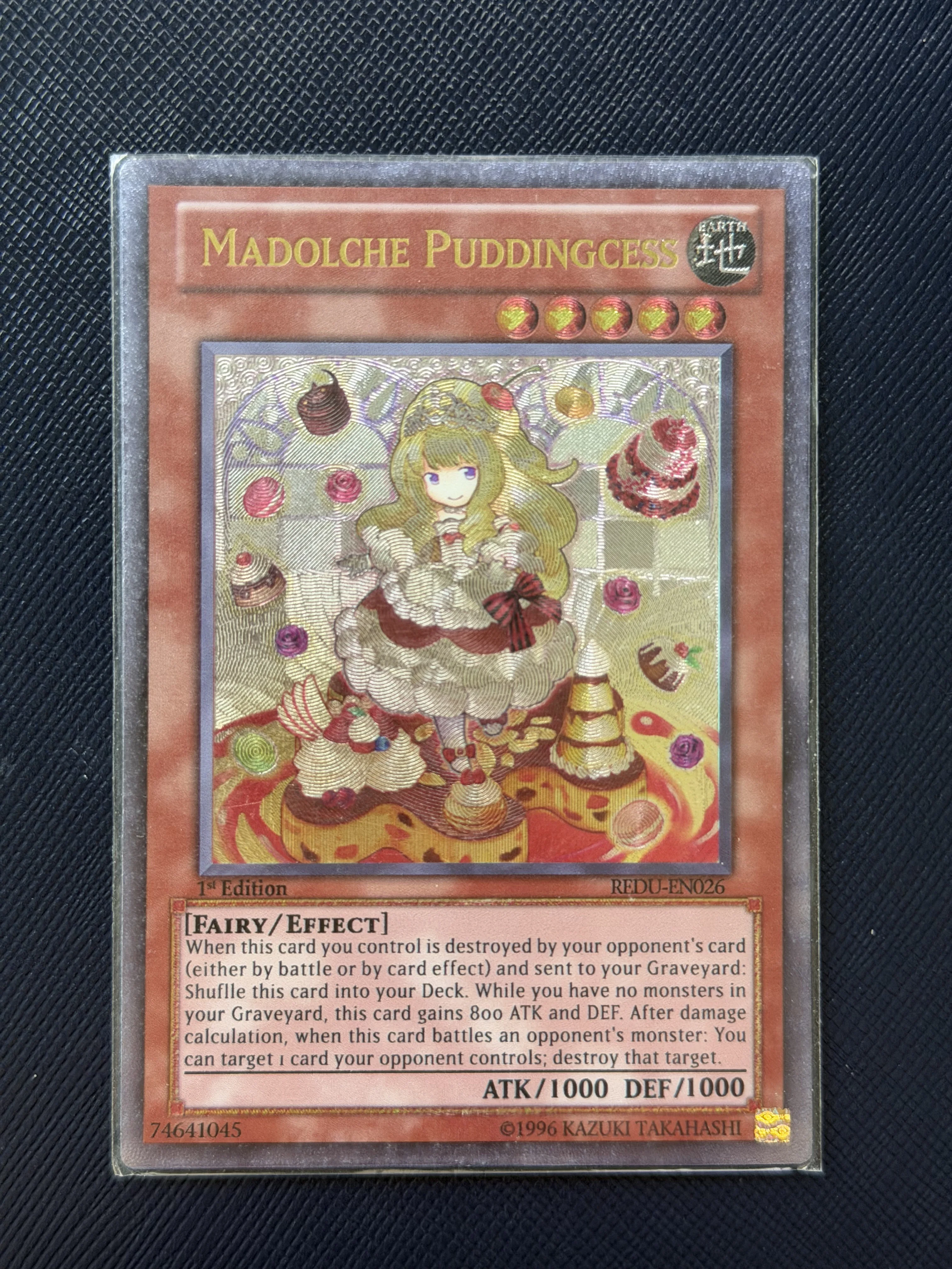 

Yu-Gi-Oh! Madolche Puddingcess REDU-EN026 ULTIMATE RARE DIY Custom Collectible Trading Card (Not Original)