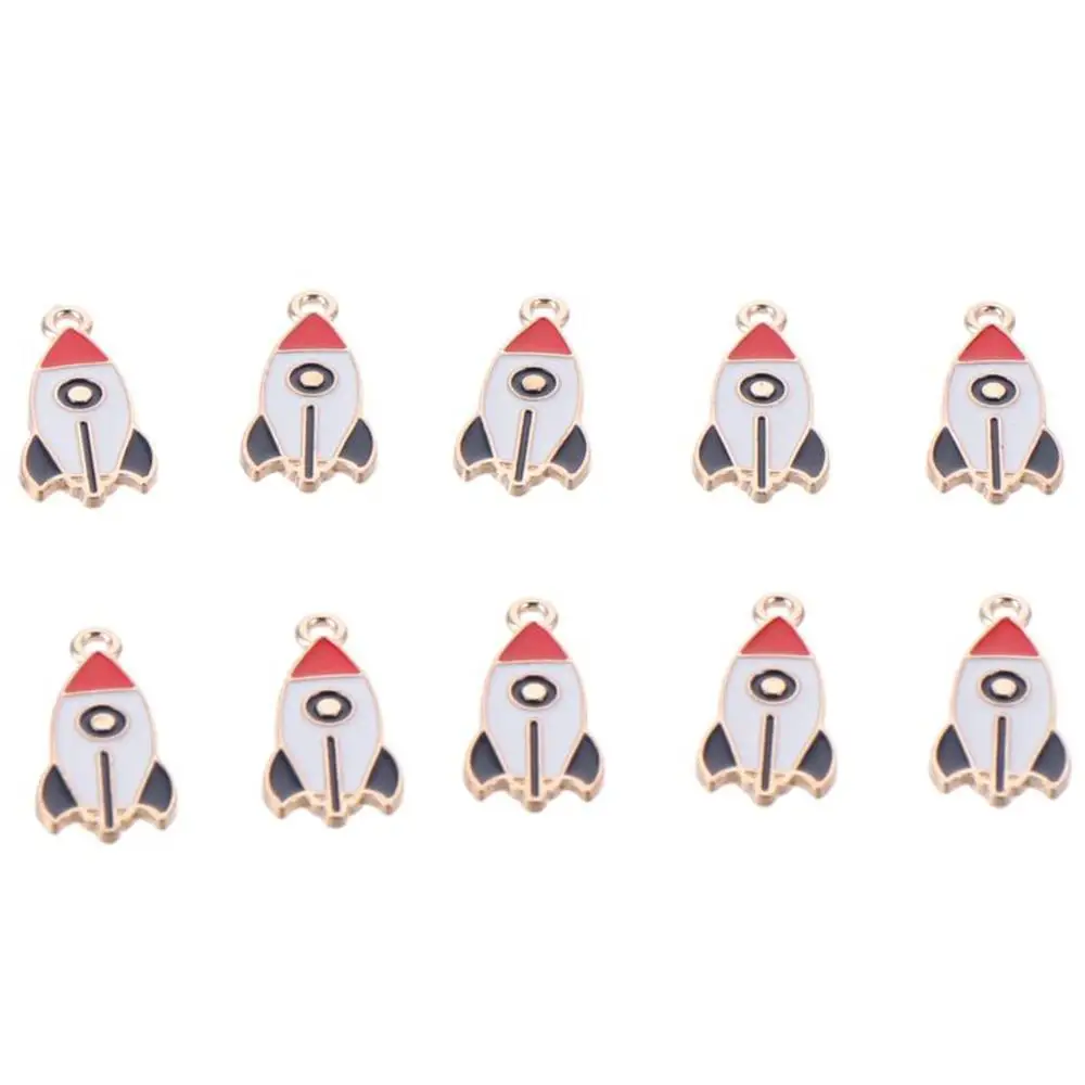 Dijes esmaltados de cohete chapados en oro esmaltado, colgantes esmaltados de aleación de Zinc de 13x27mm, abalorio con tema espacial para fabricación de joyas