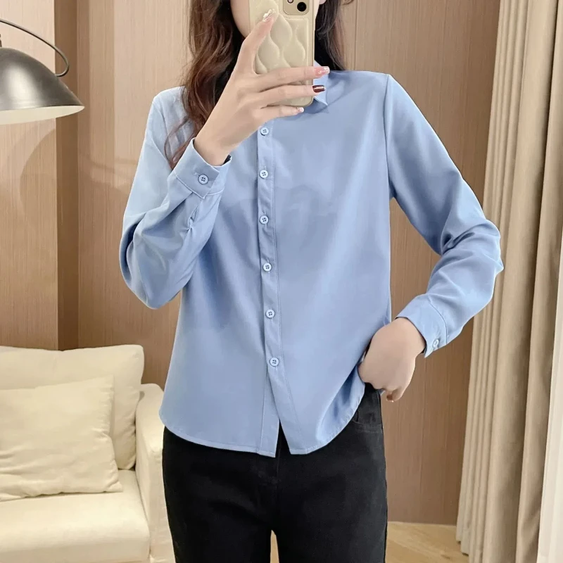 Blus kemeja lengan panjang wanita, baju blus lengan panjang kasual ramping minimalis warna polos modis kerah Polo sambungan baru musim gugur dan semi 2024