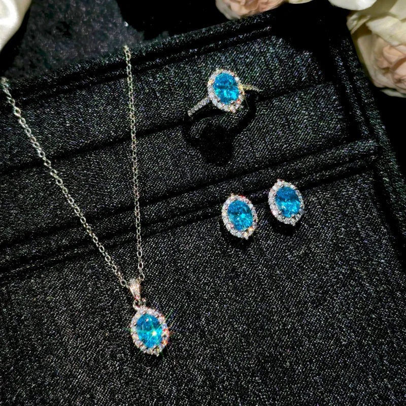 

Luxurious Ice Flower Cut Aquamarine Zircon Three-Piece Women's Diamond-Encrusted Necklace Earrings Ring Set