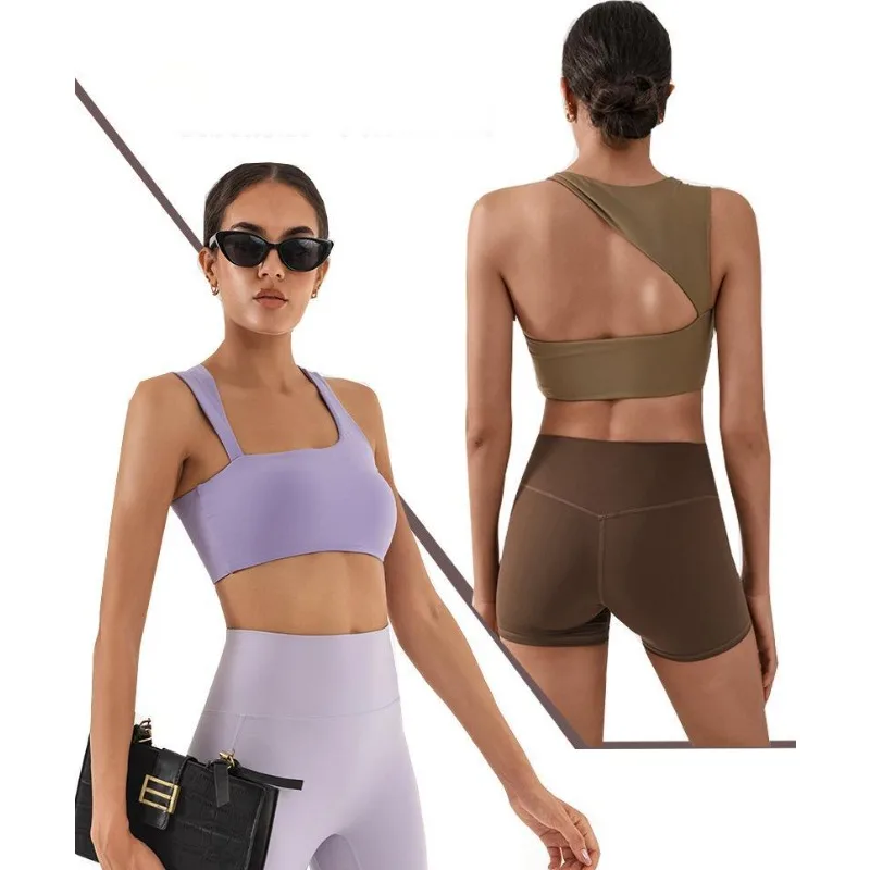 Sujetador deportivo de Yoga para mujer, sujetadores de realce para Fitness, un hombro, a prueba de golpes, negro y blanco, sujetador para correr, chaleco Sexy, ropa deportiva para gimnasio