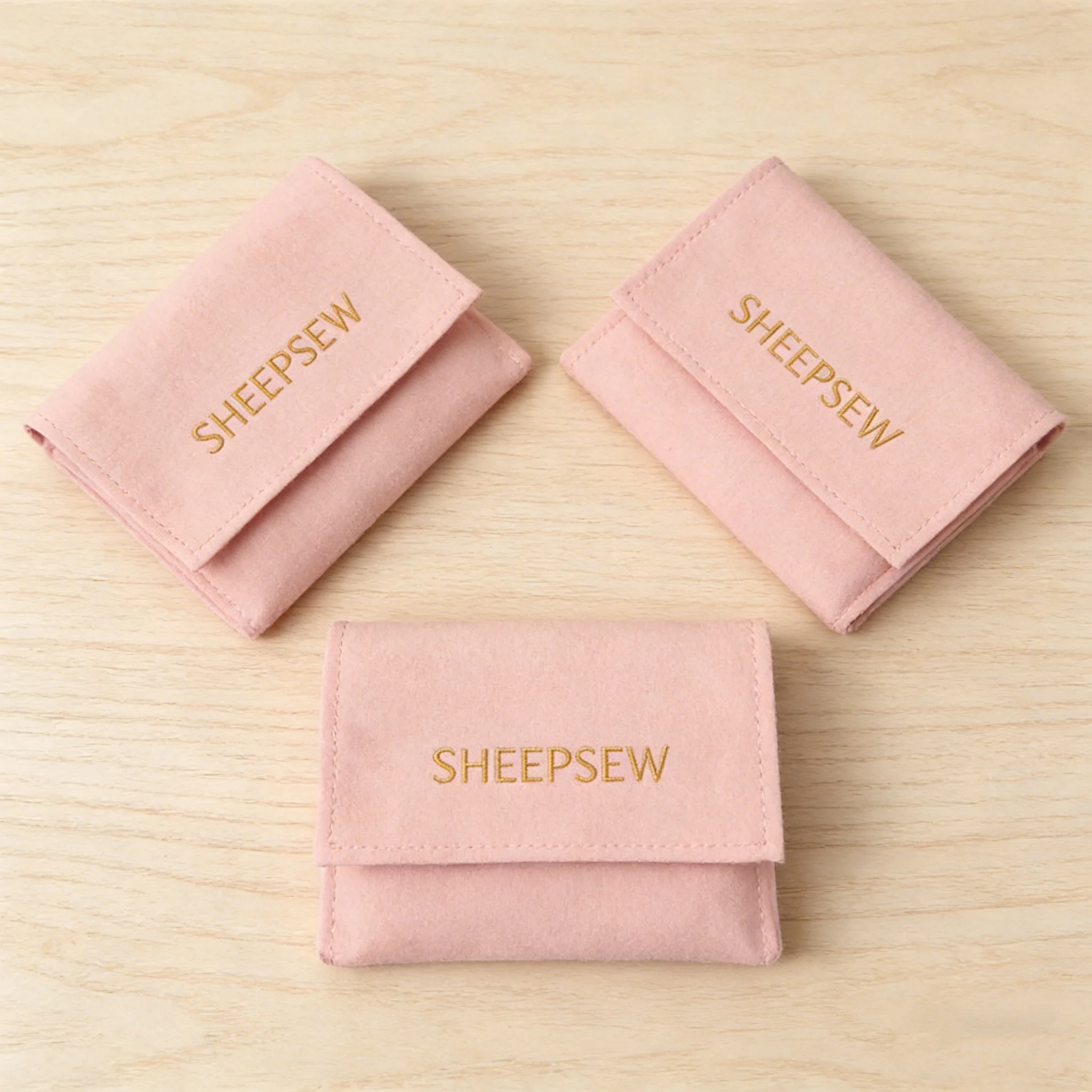 

Роскошный мешочек для украшений SHEEPSEW из микрофибры с тисненым логотипом и вкладышем для колец, серег, ожерелий SHEEPSEW