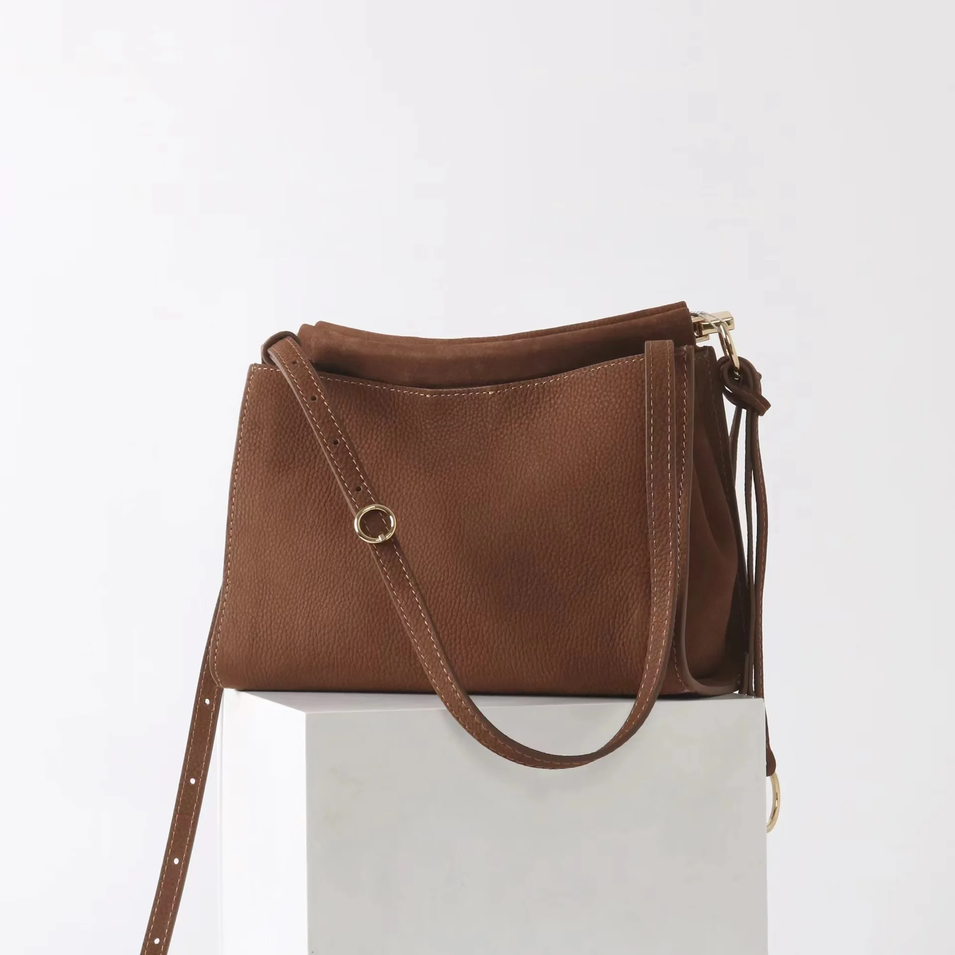 

2025 New First-layer Cowhide Suede Underarm Retro French Baguette Clip Bag Niche Design Minimalist Commuter Women's Bag