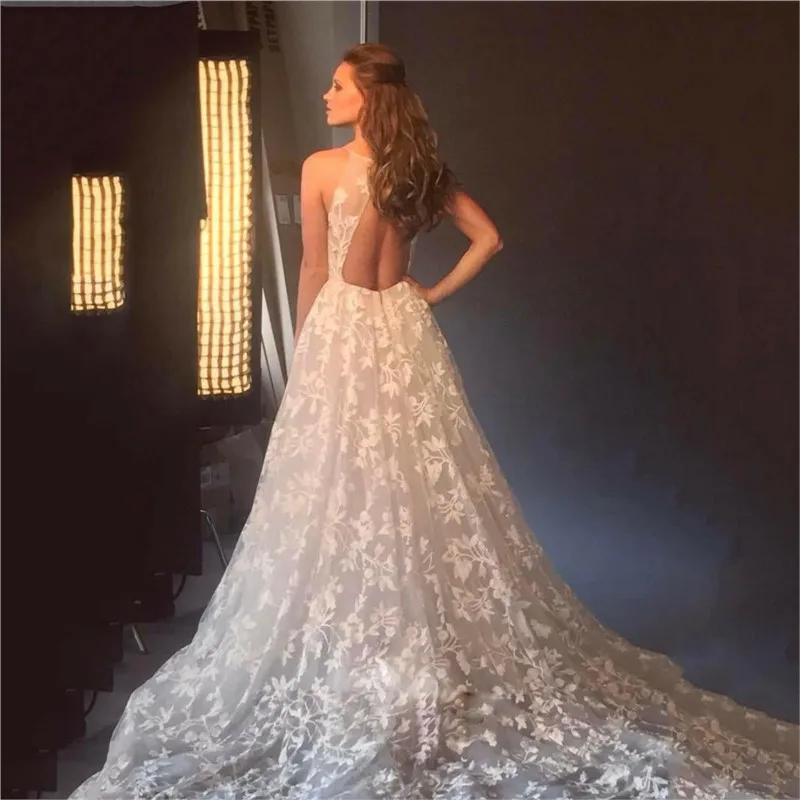 

A new elegant and fashionable cut-out long dress with neckline halter