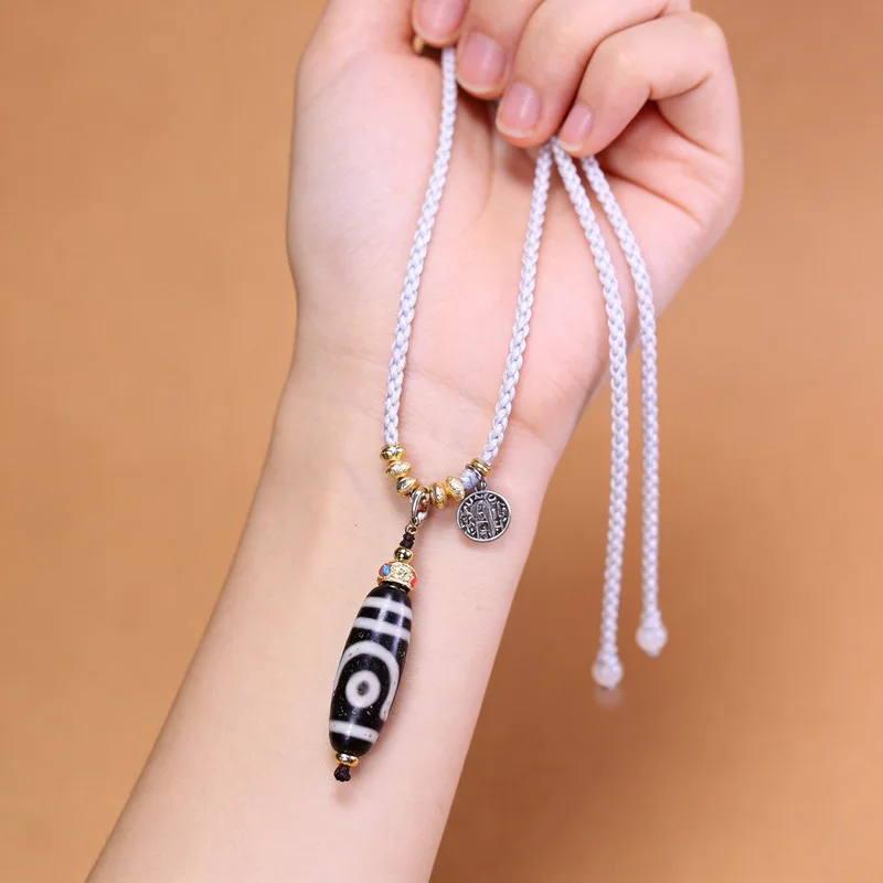 natural raw stone old agate black and white two-eye dzi bead pendant Tibetan style necklace, approximately 13x36mm