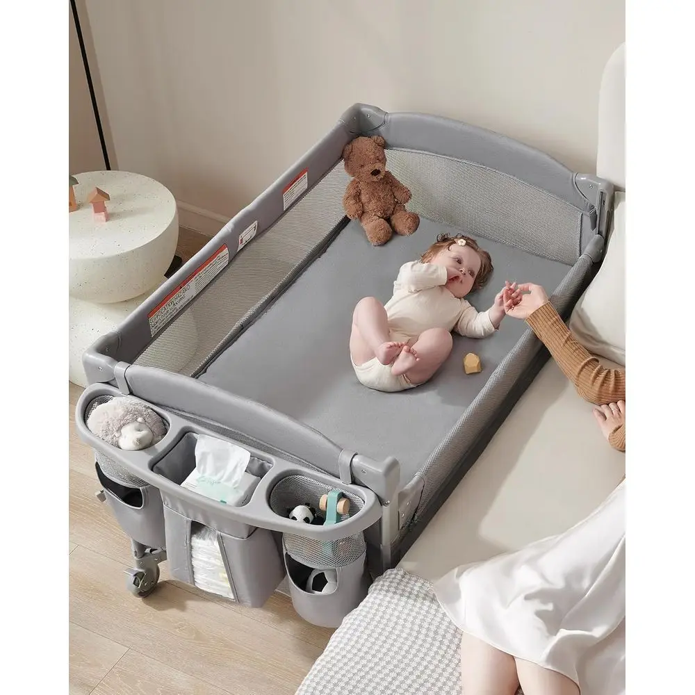 Multi-Functional Baby Bassinet: Crib, Playard, Changing Table, Bedside Sleeper with Wheels & Brakes