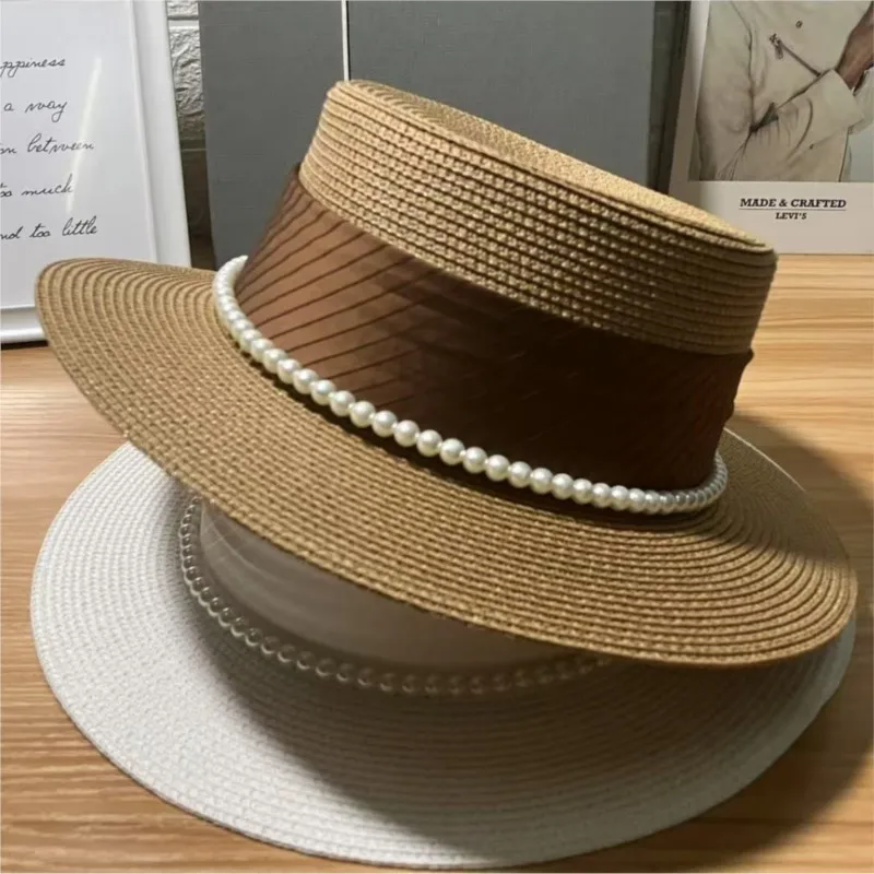 A new style of elegant straw-woven hat with lady's suitable for children