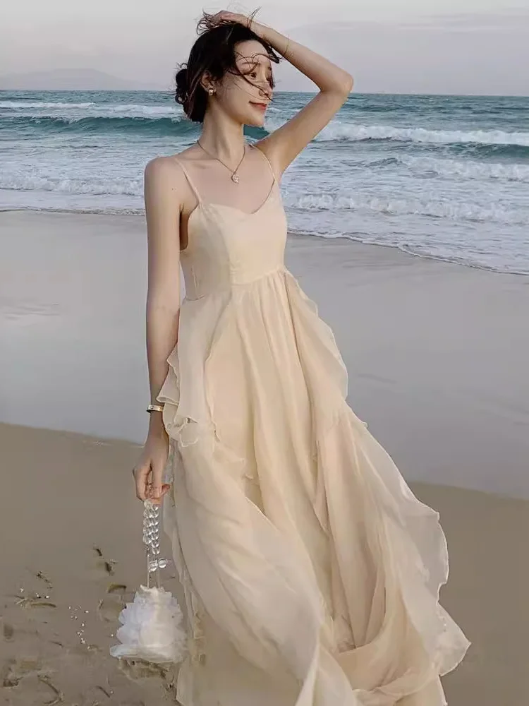 

Fairy suspender dress seaside vacation dress summer beach long dress new apricot colored Sanya slim fit waist sweet MDHH