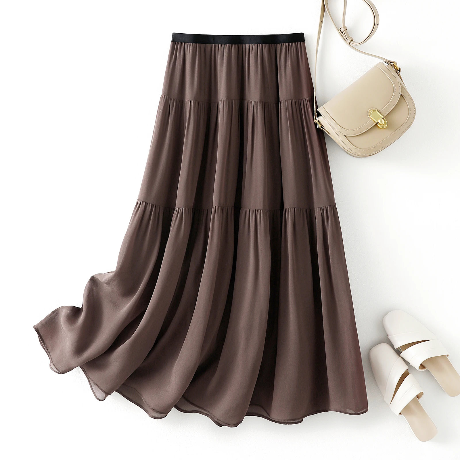 Elastic waist collision simple temperament bustier skirt 2024 summer women's flowy A swing medium-length bustier skirt