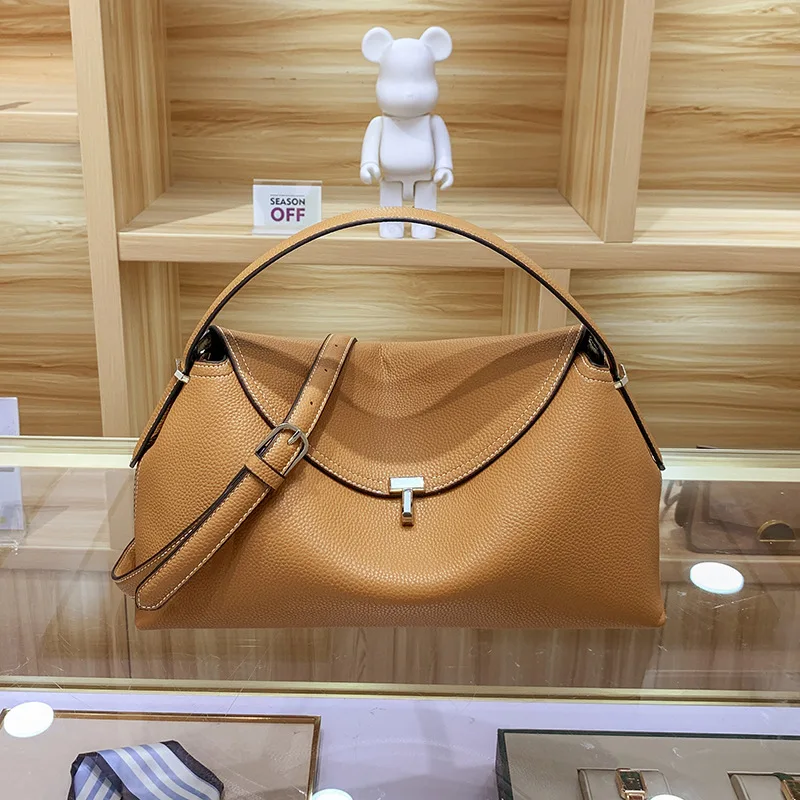 Luxury design brand women\'s cowhide metal lock pebble handbag new versatile fashion light luxury niche shoulder bag for women