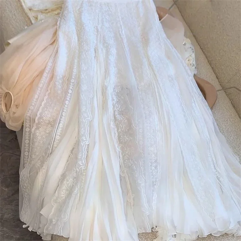 Nouvelle mode fleur broderie dentelle Jupe femmes français élégant Tutu Tulle jupes maille a-ligne longue Jupe printemps vêtements