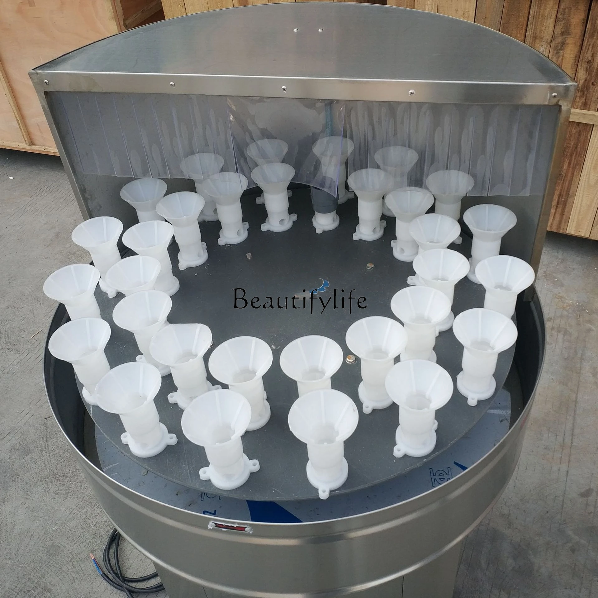 

4Semi-automatic bottle washing machine Small cosmetic bottle washing machine