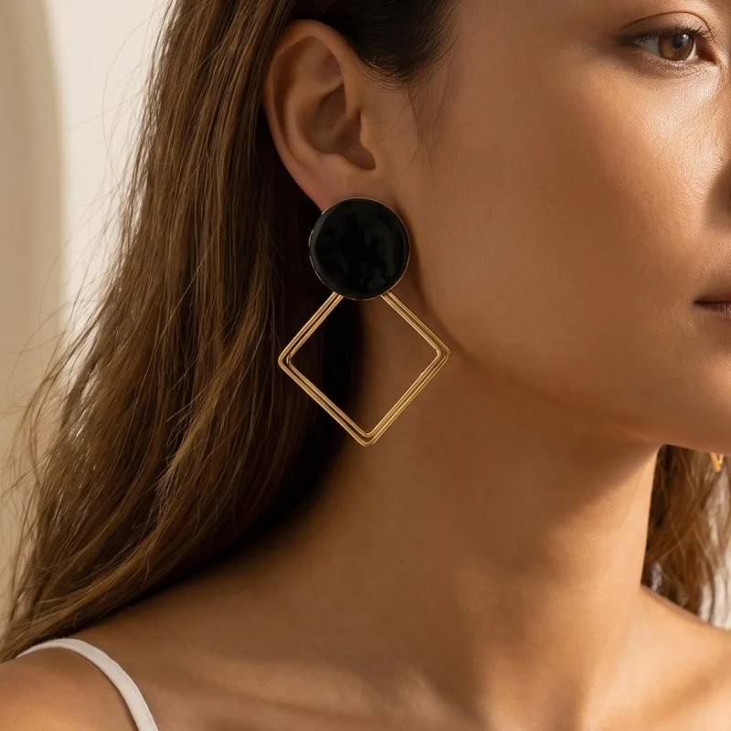 Asymmetrical geometric triangular ring earrings, niche design earrings, high-end commuter earrings