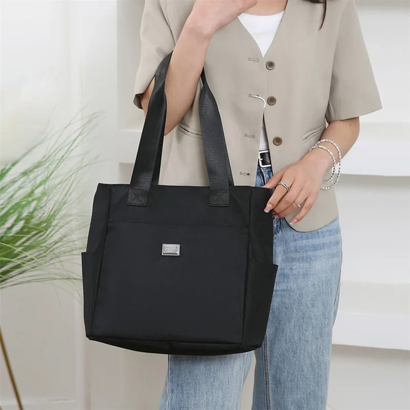 

Женская нейлоновая сумка-тоут большой вместимости — простая черная застежка-молния, прочная полиэстеровая подкладка с просторным интерьером,