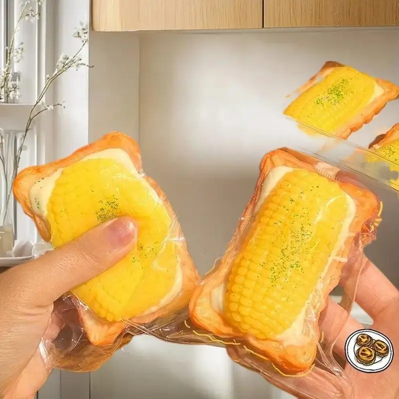 Brinquedos de pelúcia feitos à mão de tarta de ovo de milho de uma peça; Adereços de apertar para redução de estresse para jogos musicais infantis