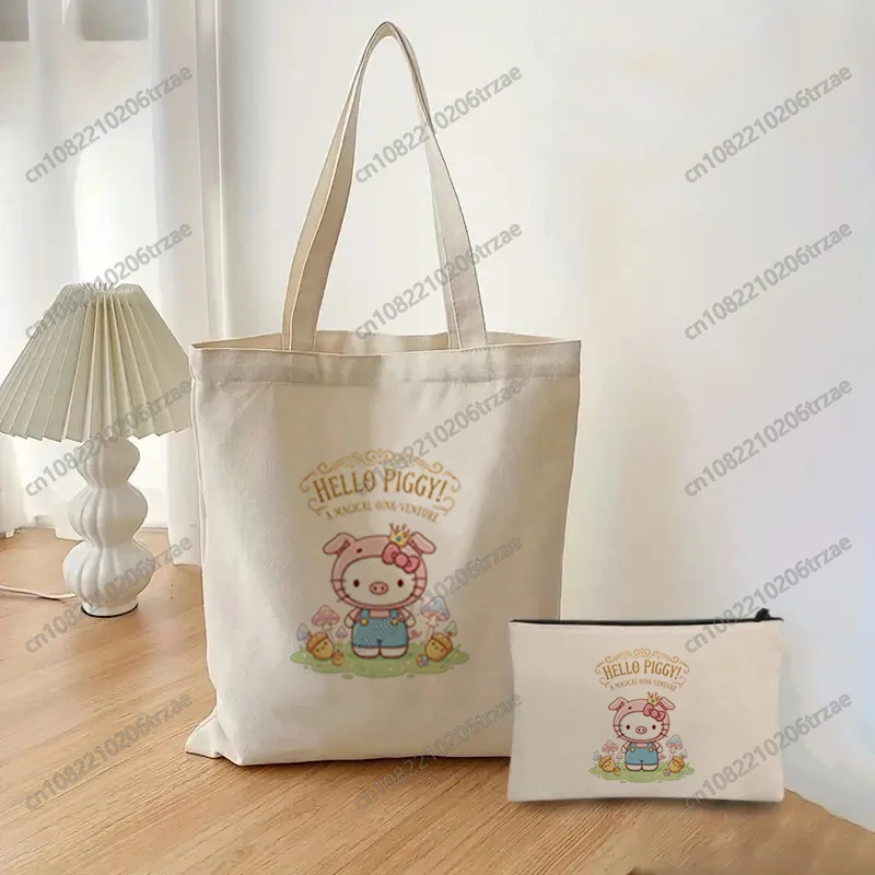 Bolsa de compras con estampado de la colección del zodíaco chino de Hello Kitty, bolsa de compras blanca Kawaii, bolsas de lona de viaje a la moda Unisex, bolsa de maquillaje