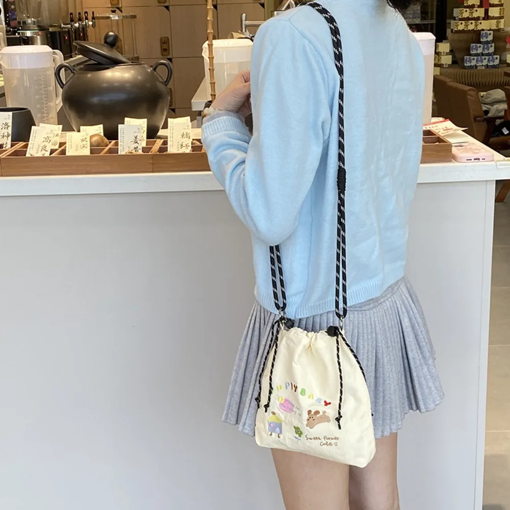 

Cartoon Nylon Shoulder Bag Multicolor Large Capacity Drawstring Crossbody Bag Korean Style Solid Color Mobile Phone Pack Male