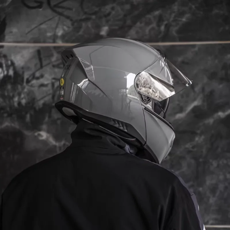 

Light Gray Flip Up Full Face Helmet with Multi-Density EPS LinerAdjustable Air Intakes Meets Strict ECE 22.06 Safety Standards