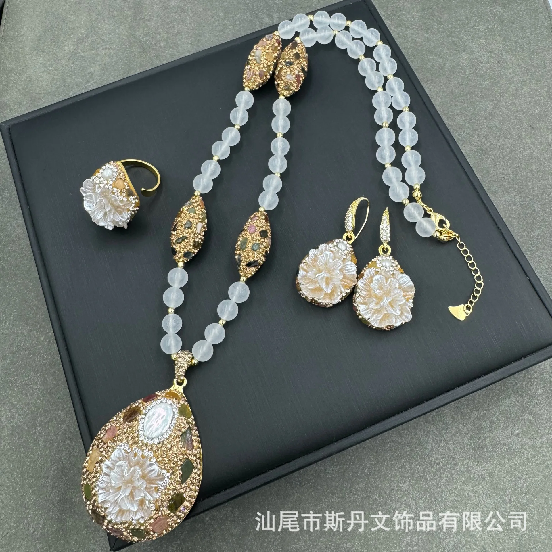 

Melaleuca flower inlaid with natural pearl set, high-end flower-shaped small fragrant direct crystal necklace earrings rings