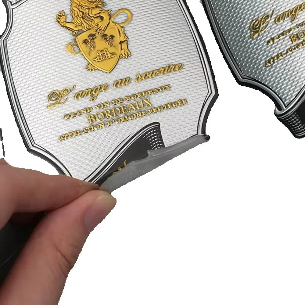 

Custom Metal Embossed Brand Name Labels | Self-Adhesive Stickers for Wine Bottles Packaging