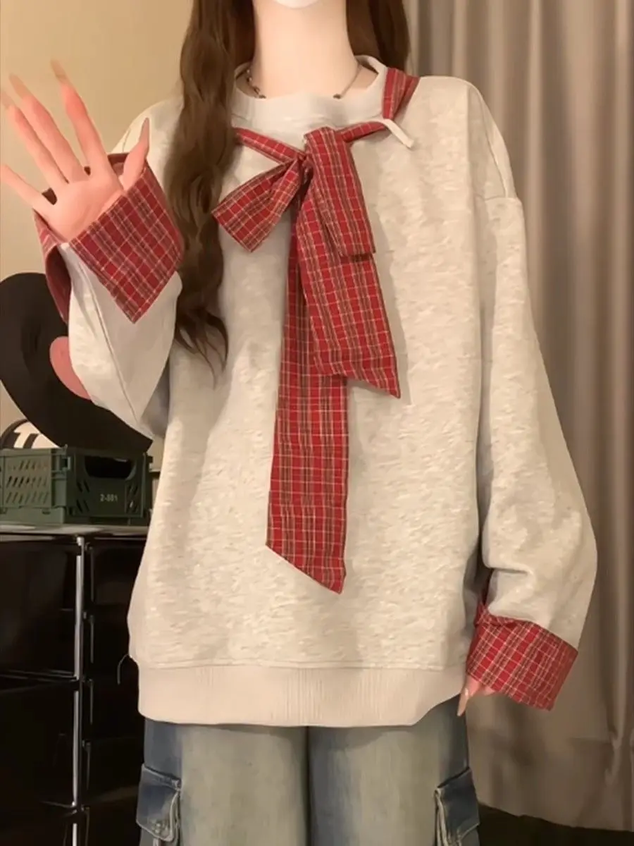 Vendita calda alla moda alla moda, carino, a quadretti, con fiocco legato, spalle scoperte, squisita felpa con cappuccio, vacanze primaverili, due maniche lunghe