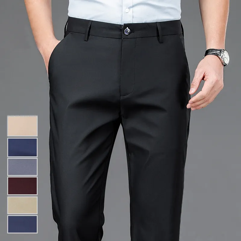 Pantalones elásticos para hombre, pantalón informal de secado rápido, color negro sólido, estilo coreano, para oficina, novedad, primavera y otoño