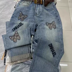 Jeans Harem a vita alta Fat Sister per donna Nuovi pantaloni a nove punte da papĂ con ricamo sottile e allentato alla moda